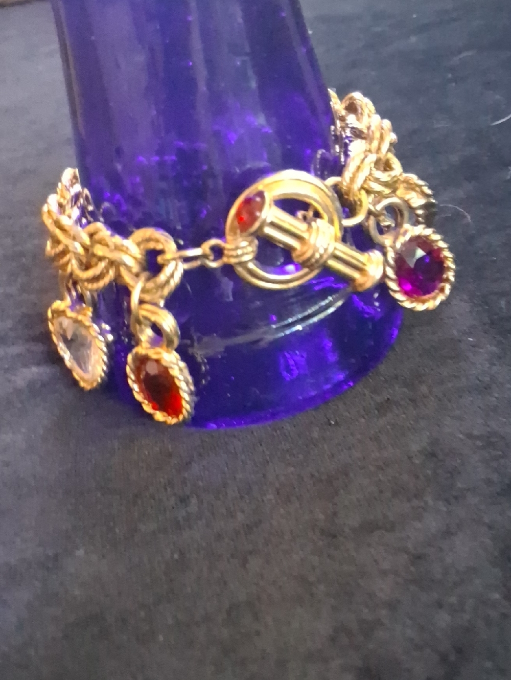 Givenchy 1980's Gold Plated Charm Bracelet with Red, Purple, and Clear Stones